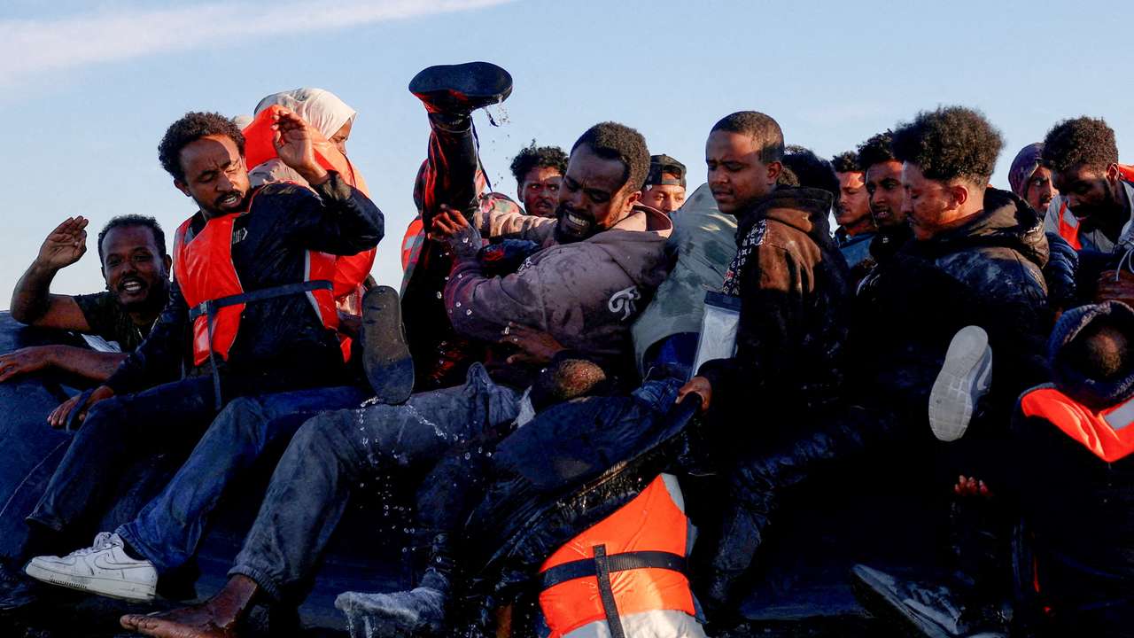 FILE PHOTO: Migrants attempt to cross the English channel from northern France