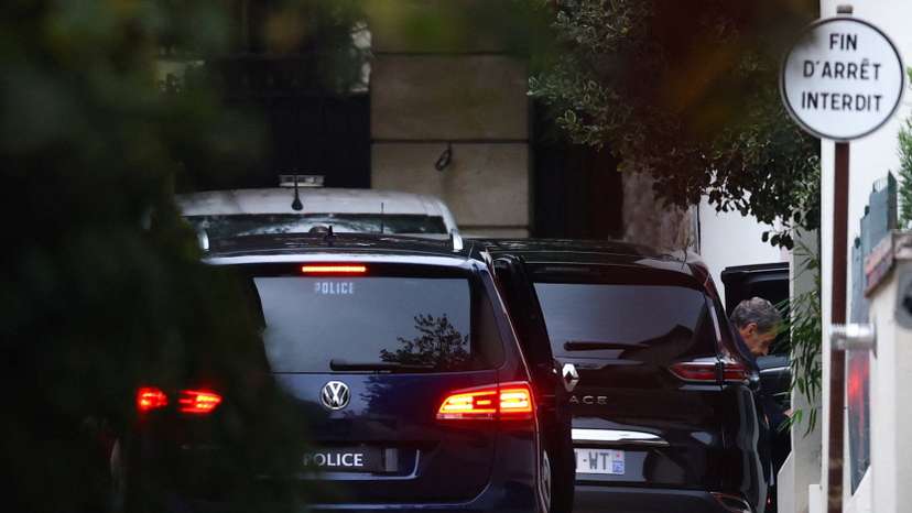 Former French President Sarkozy arrives at his house after being released from jail, in Paris