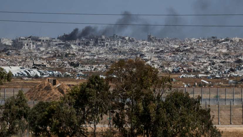 An Israeli military jeep patrols near the Israel-Gaza border