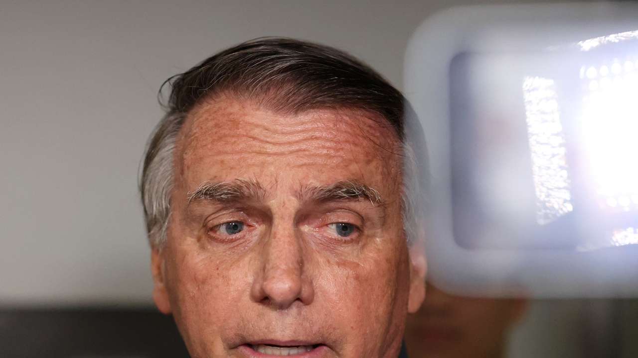 Former Brazilian President Jair Bolsonaro leaves the Liberal Party headquarters in Brasilia