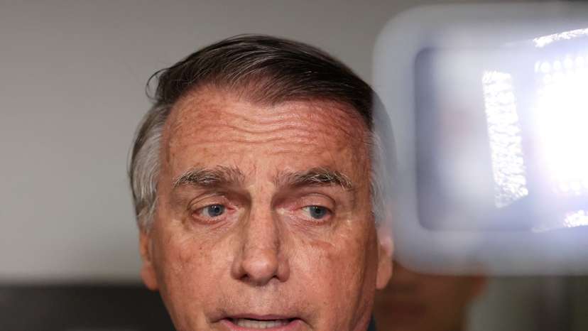 Former Brazilian President Jair Bolsonaro leaves the Liberal Party headquarters in Brasilia