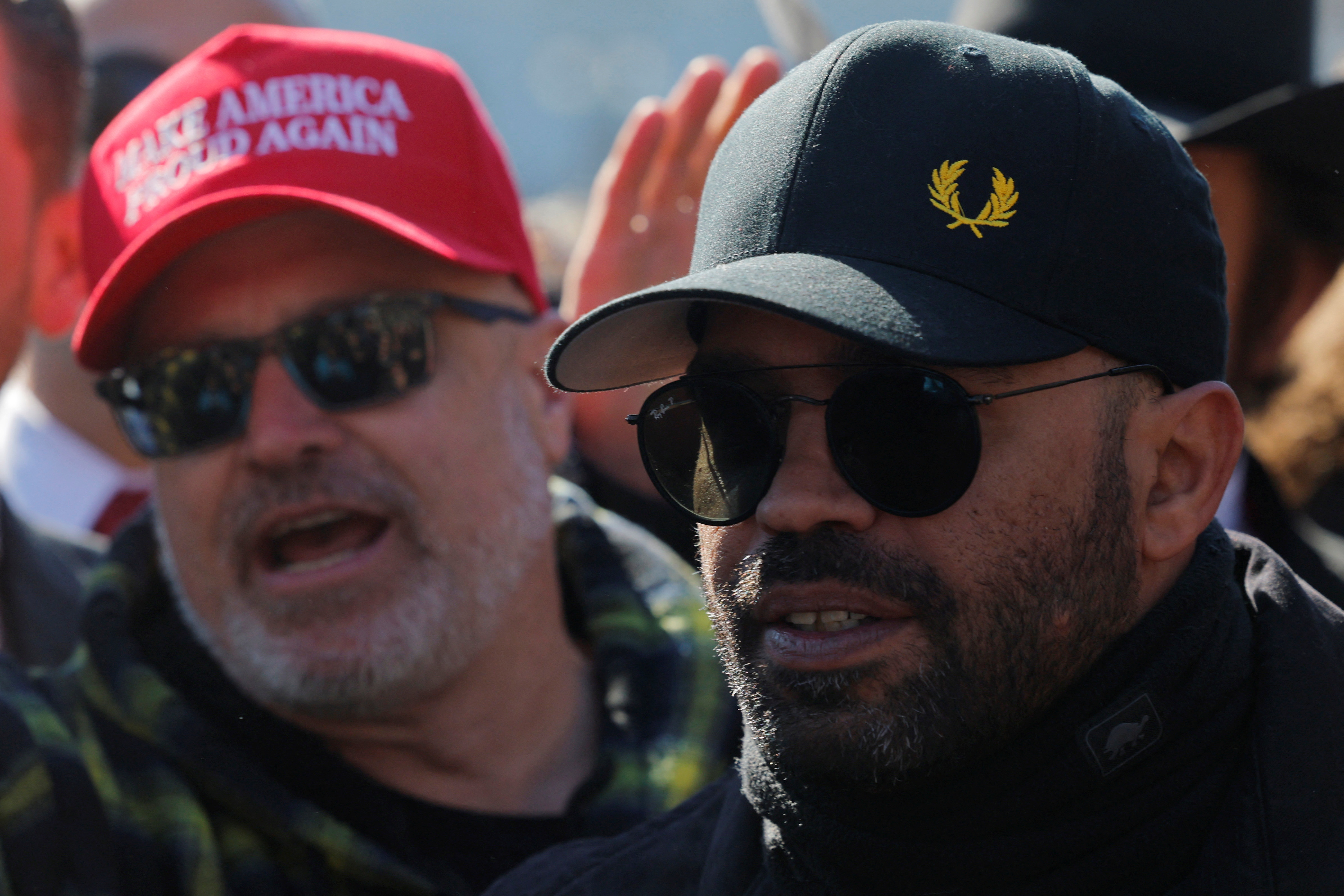 Former Proud Boys and Oath Keeper leaders hold a press availability in Washington