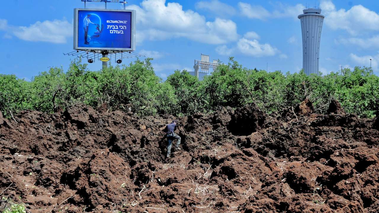 A view of the site of a missile attack, launched from Yemen, near Ben Gurion Airport, in Tel Aviv