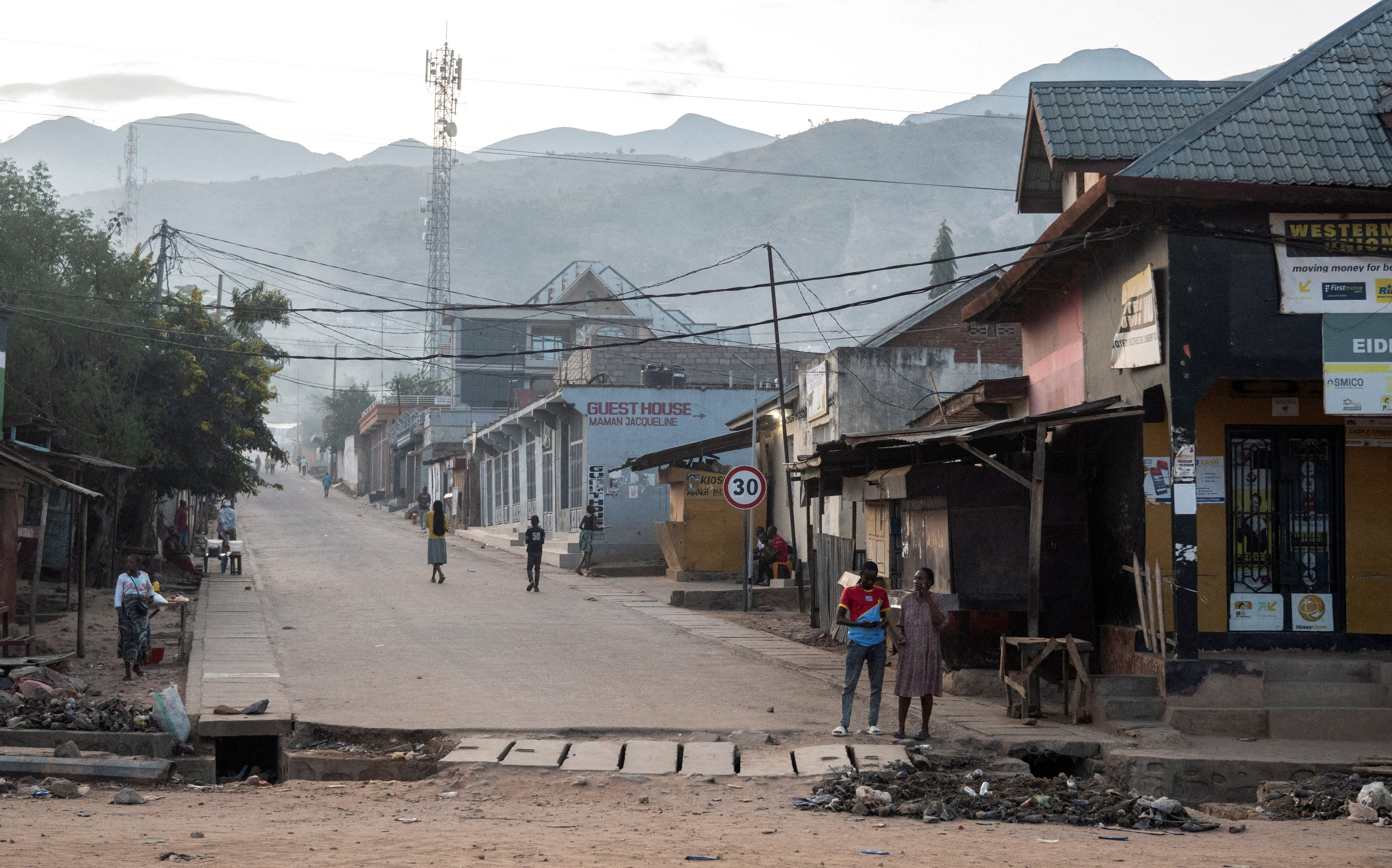 FILE PHOTO: Congolese civilians gather after returning to their homes following displacement during renewed clashes between AFC/M23 and FARDC in Uvira