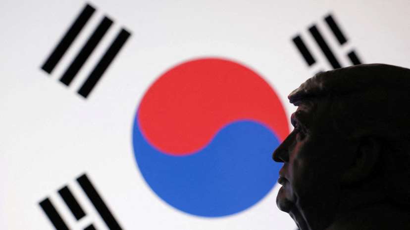 FILE PHOTO: Illustration shows 3D-printed miniature model of U.S. President Donald Trump, South Korea flag