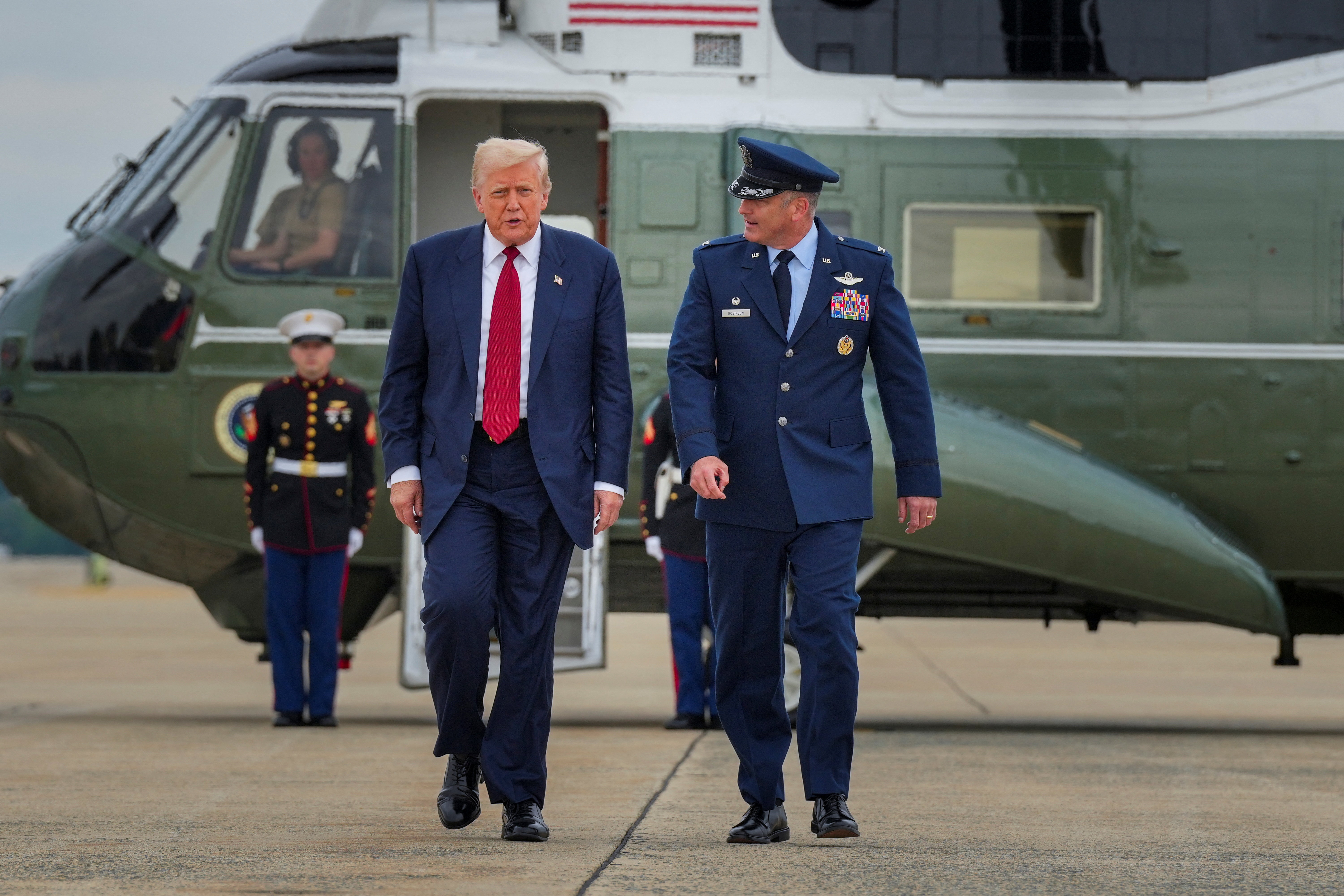 U.S. President Donald Trump steps off Marine One at JBA on his way to New Jersey