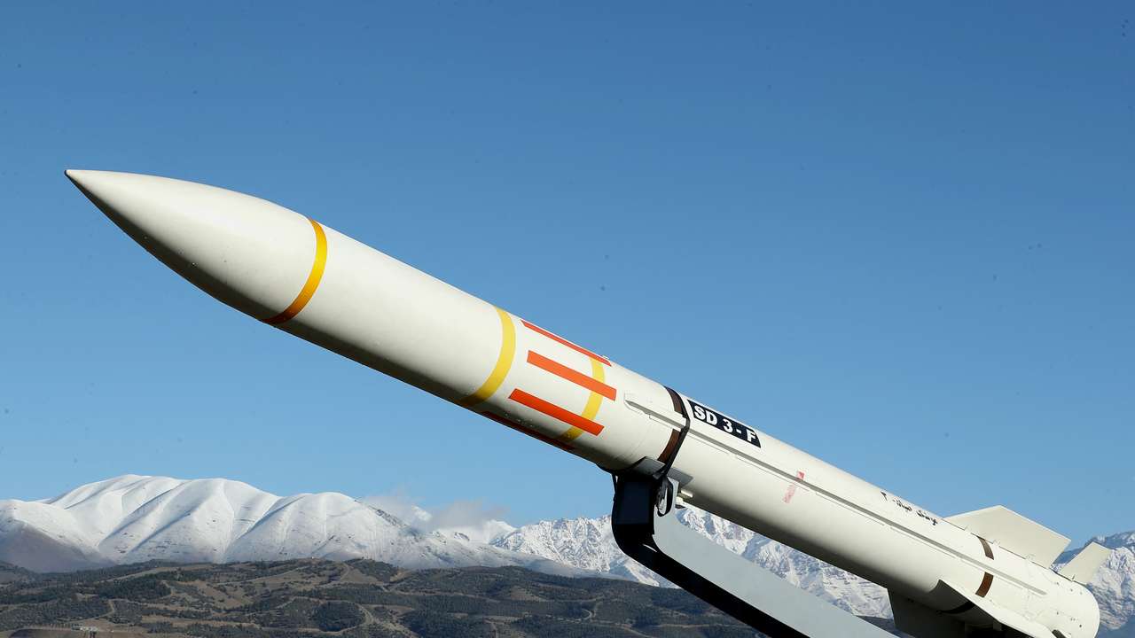 An Iranian missile is displayed during an unveiling ceremony in Tehran