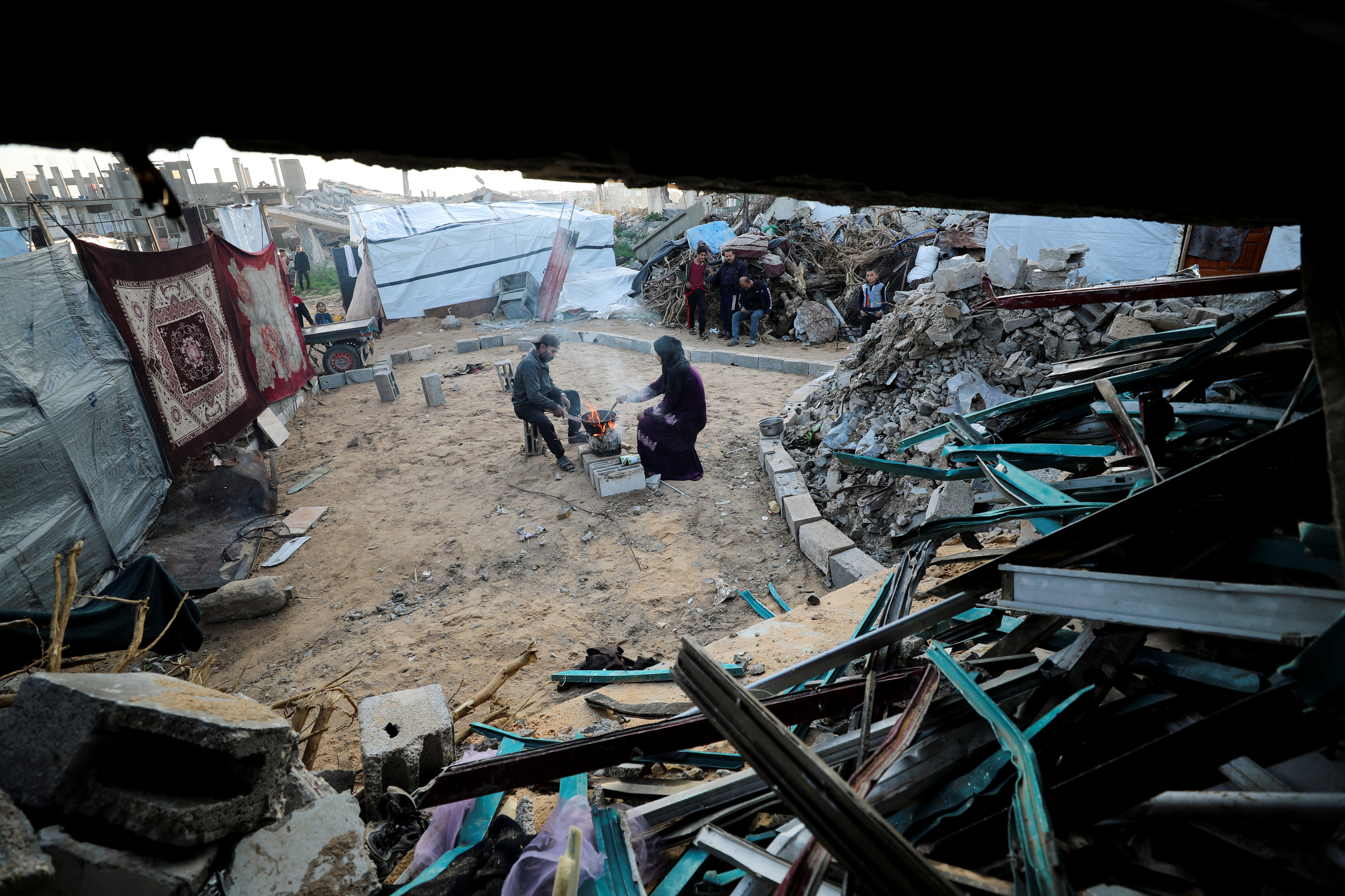 Palestinian family prepares Iftar meals during the holy month of Ramadan, in Jabalia