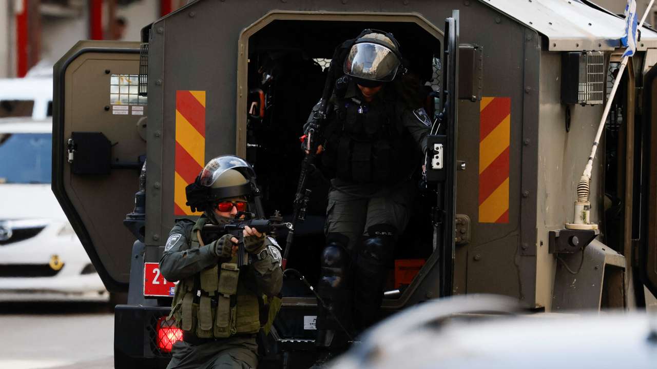Israeli troops raid the houses of Palestinians believed to be assailants, in the West Bank