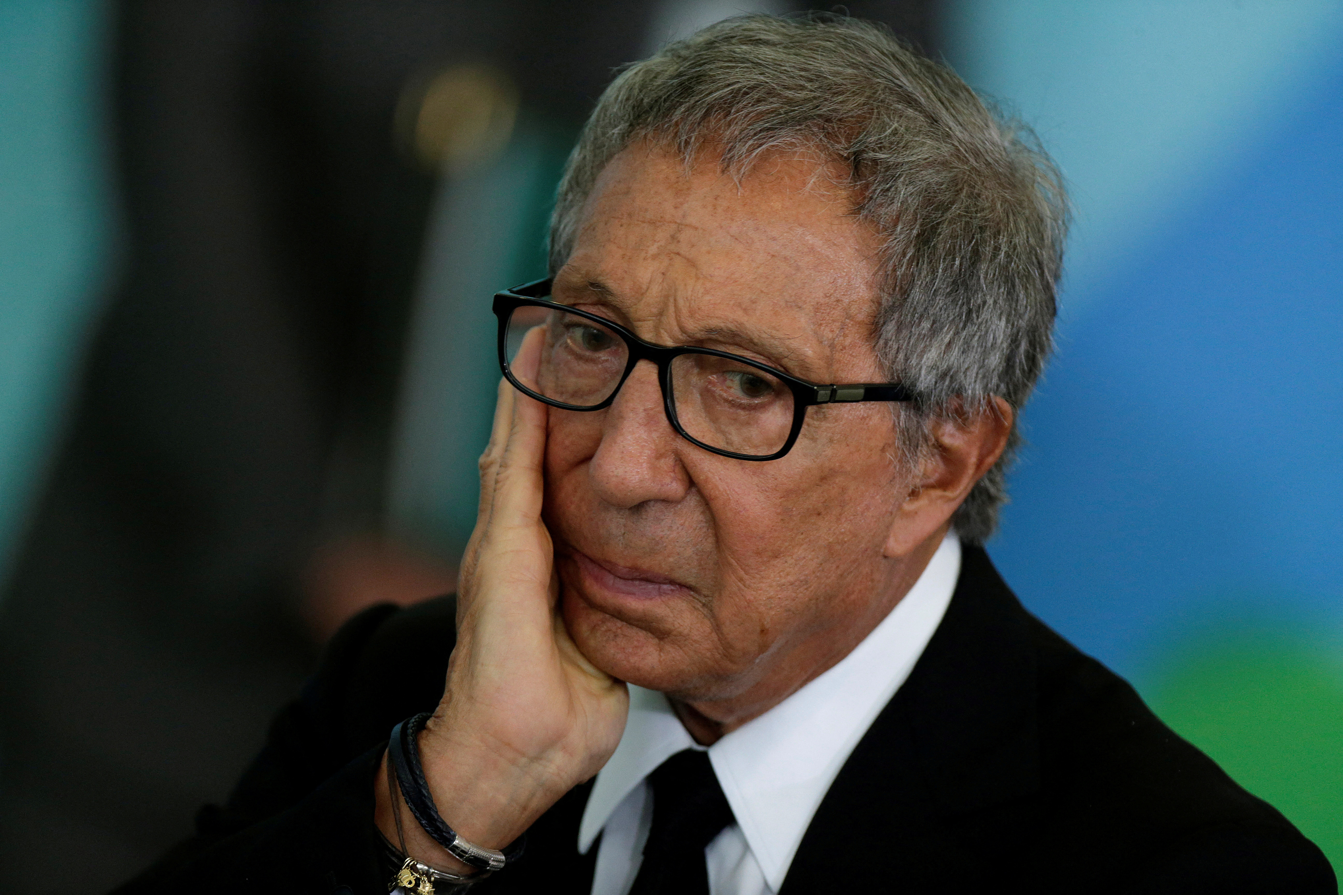 FILE PHOTO: Abilio Diniz, the third largest Carrefour shareholder gestures during a meeting of the Council for Economic and Social Development (CDES) at the Planalto Palace in Brasilia