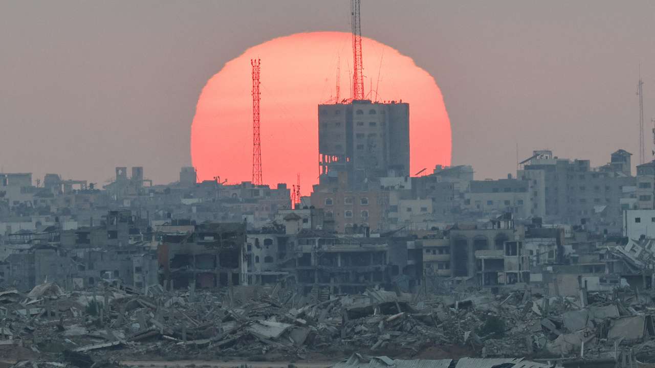 The sun sets over Gaza, as seen from Israel