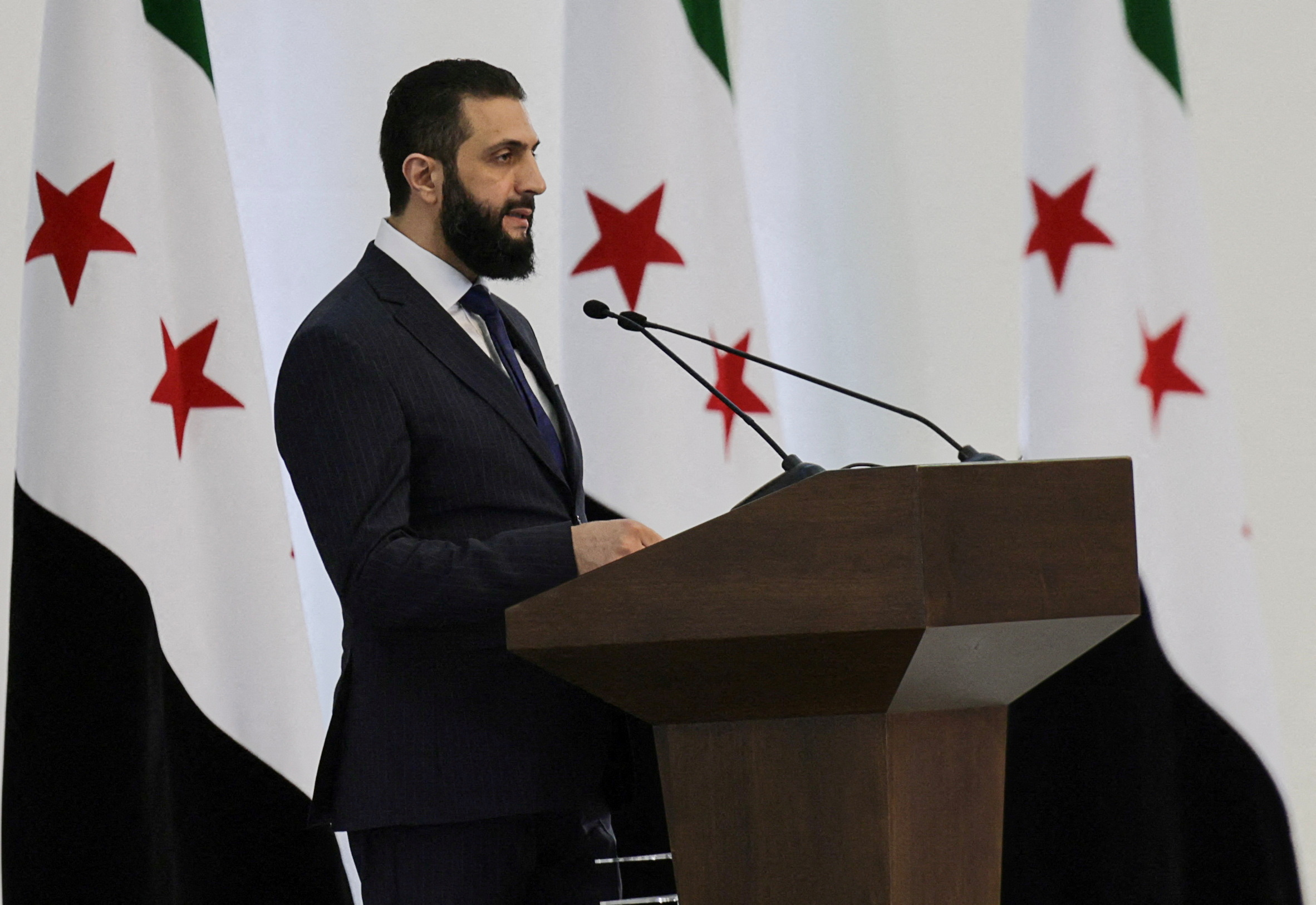 Syria's interim President Ahmed al-Sharaa speaks during a Ministerial formation of the government of the Syrian Arab Republic, in Damascus