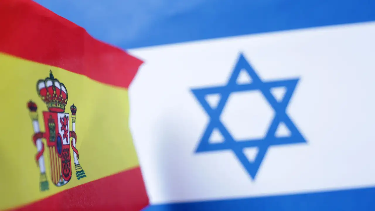 Illustration shows Spain and Israel flags
