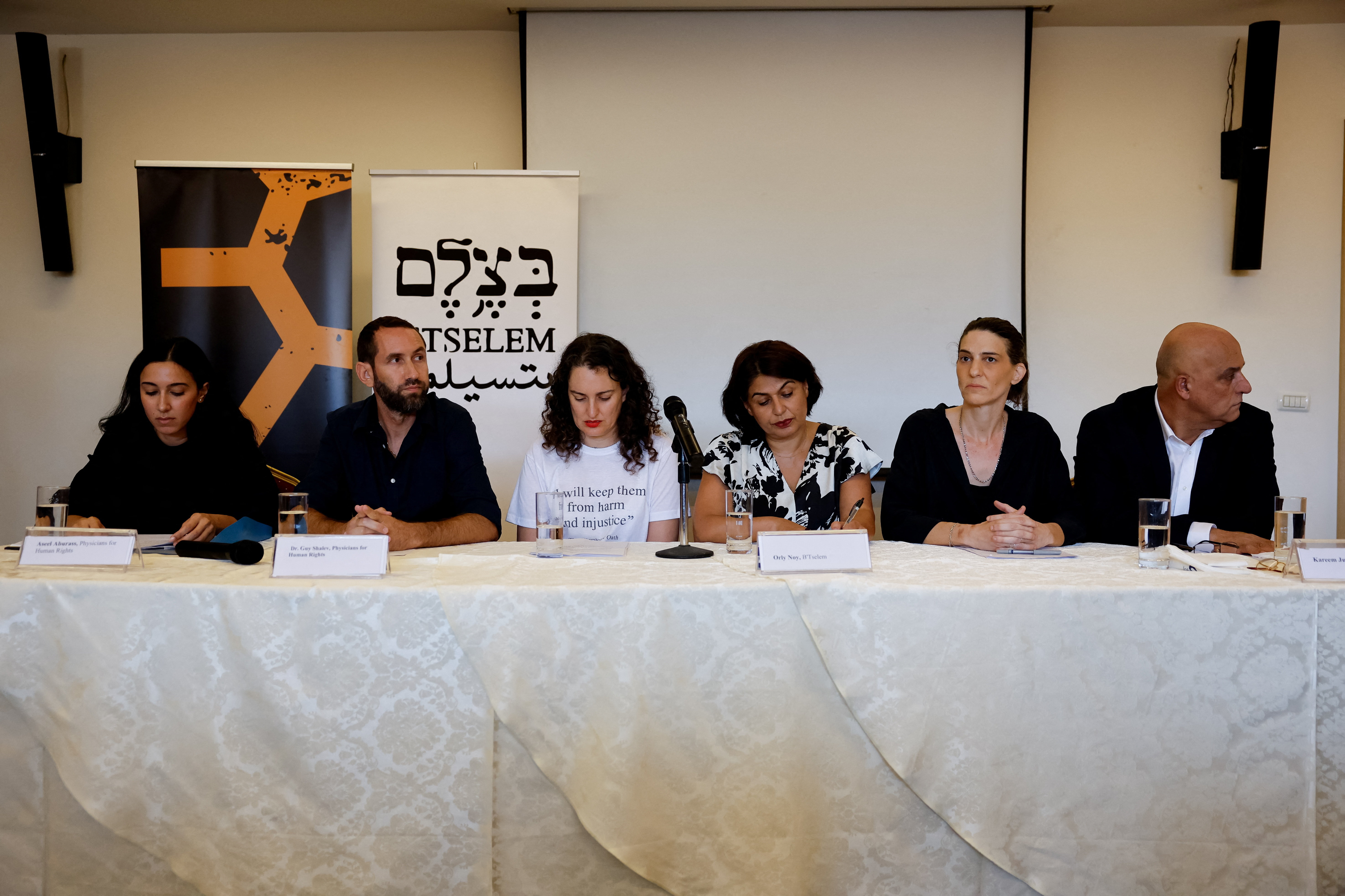 Israeli human rights groups hold a press conference to issue a report saying Israel is committing a genocide in Gaza, in East Jerusalem
