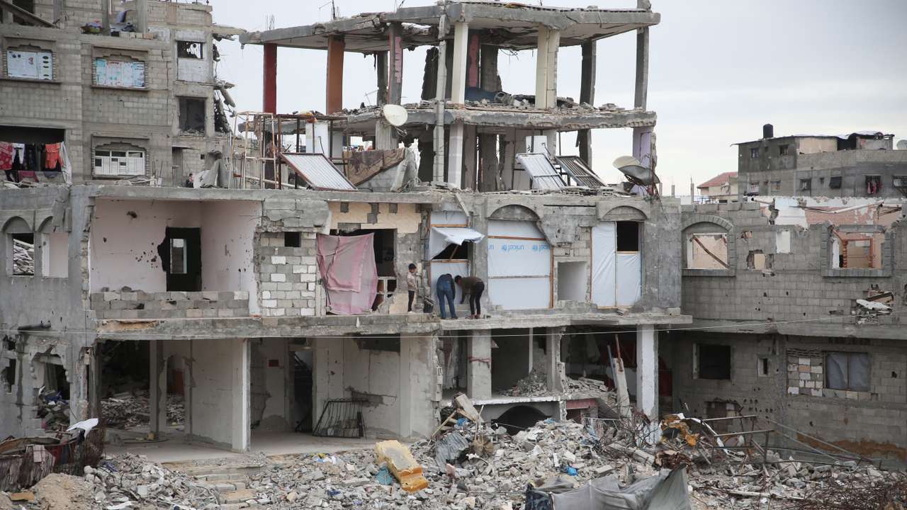 Buildings destroyed in the Israeli offensive lie in ruins, in Khan Younis in the southern Gaza Strip