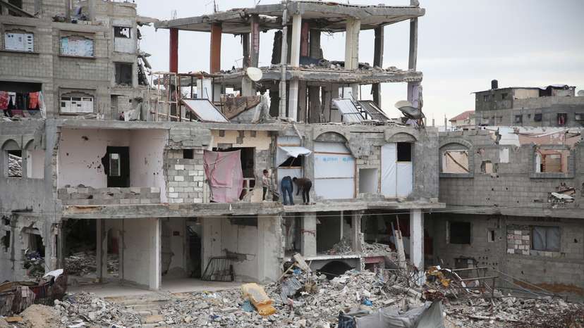 Buildings destroyed in the Israeli offensive lie in ruins, in Khan Younis in the southern Gaza Strip
