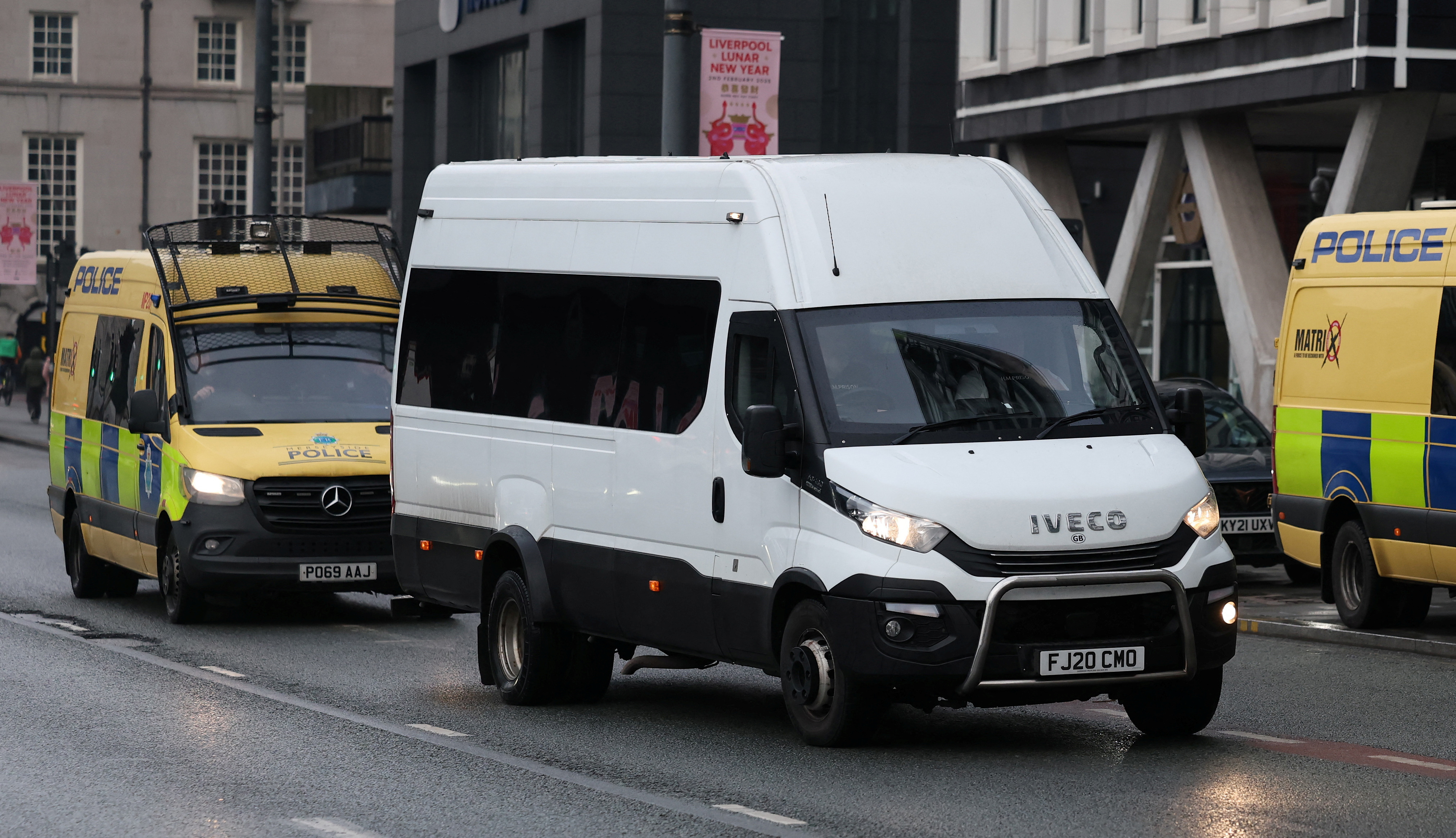 Prison van believed to contain suspect Rudakubana, arrives under escort at Liverpool Crown Court