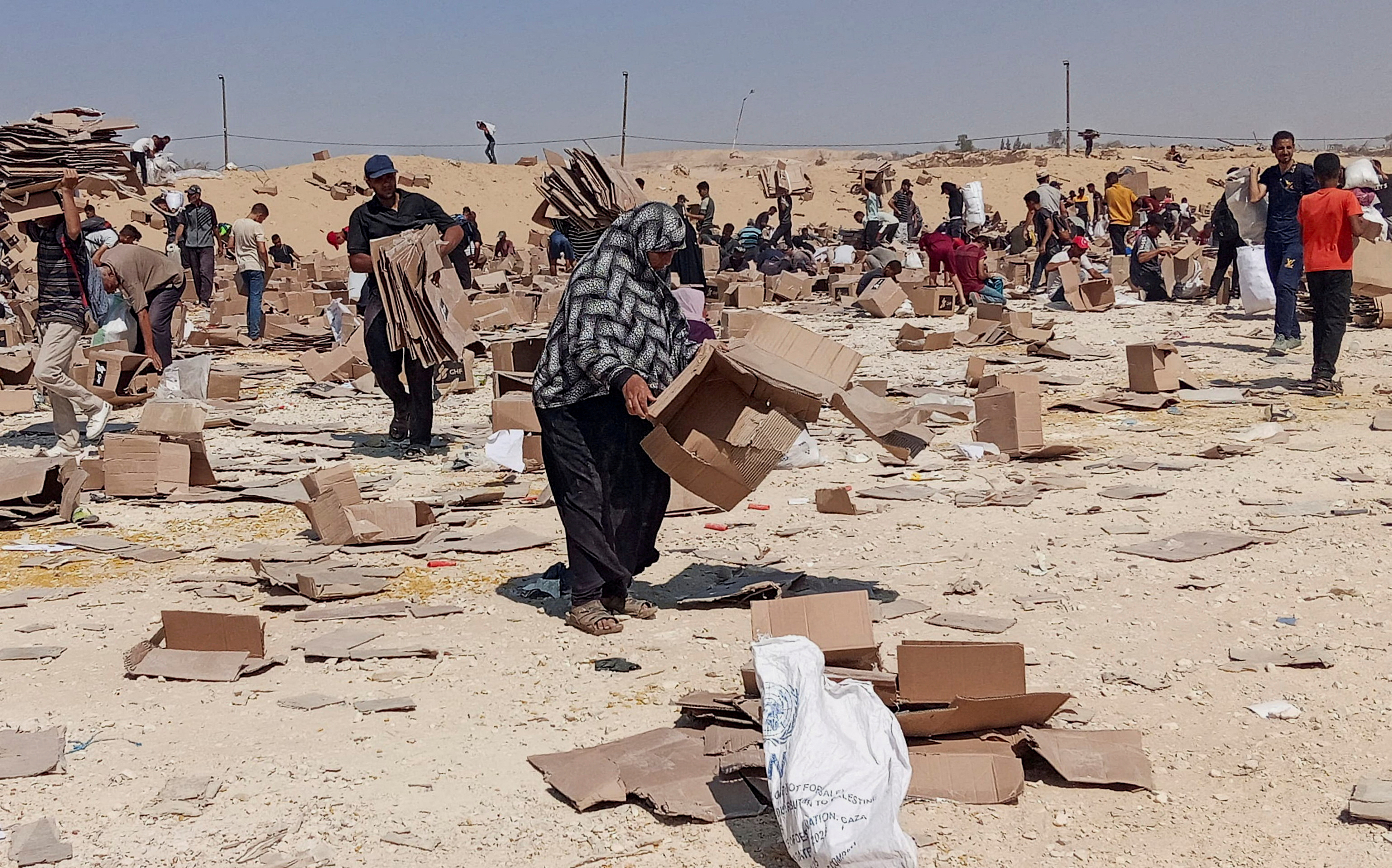 FILE PHOTO: FILE PHOTO: Visual story on the ordeal Gazans endure to get food under new aid distribution programme in Rafah