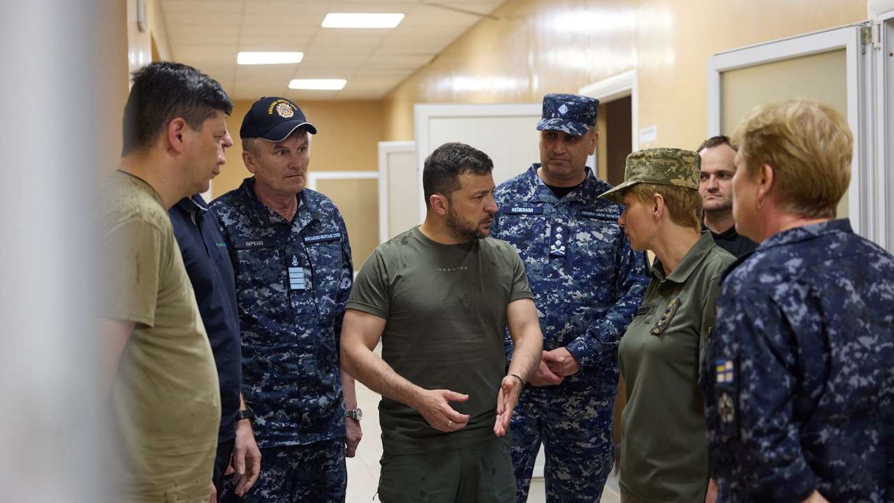 FILE PHOTO: Ukraine's President Zelenskiy speaks visits a military hospital in the town of Ochakiv