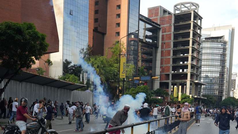 Supporters of the Venezuelan opposition demonstrate following the announcement that Venezuela's President Maduro won the presidential election, in Caracas