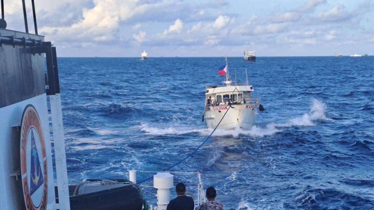 Chinese Coast Guard ship uses water cannon against a Filipino resupply vessel