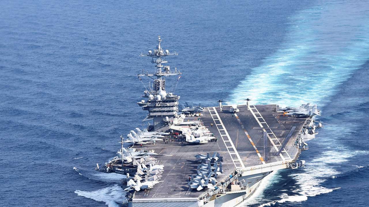 U.S. Navy aircraft carrier USS George Washington is pictured during Freedom Edge trilateral exercise among United States, Japan and South Korea in the East China Sea, south of the Korean peninsula and west of Japan's main islands