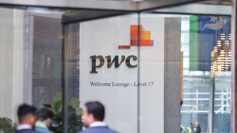 PwC sign is seen in the lobby of their offices in Barangaroo