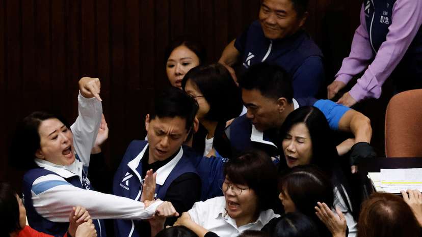 Taiwan lawmakers argue and exchange blows during a parliamentary session in Taipei