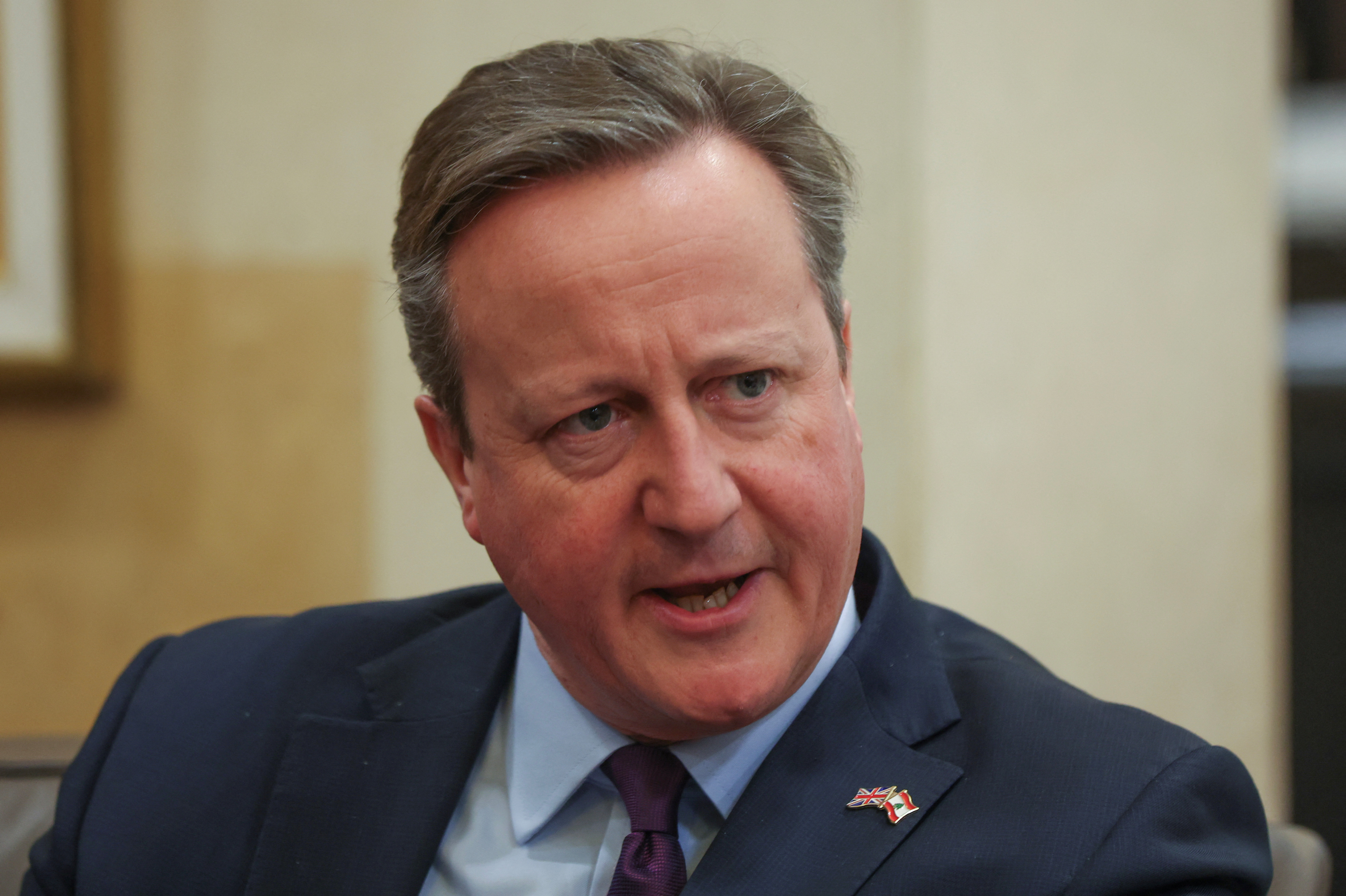 FILE PHOTO: British Foreign Secretary Cameron meets with Lebanon's caretaker PM Mikati in Beirut
