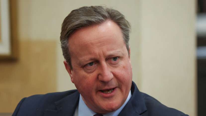 FILE PHOTO: British Foreign Secretary Cameron meets with Lebanon's caretaker PM Mikati in Beirut