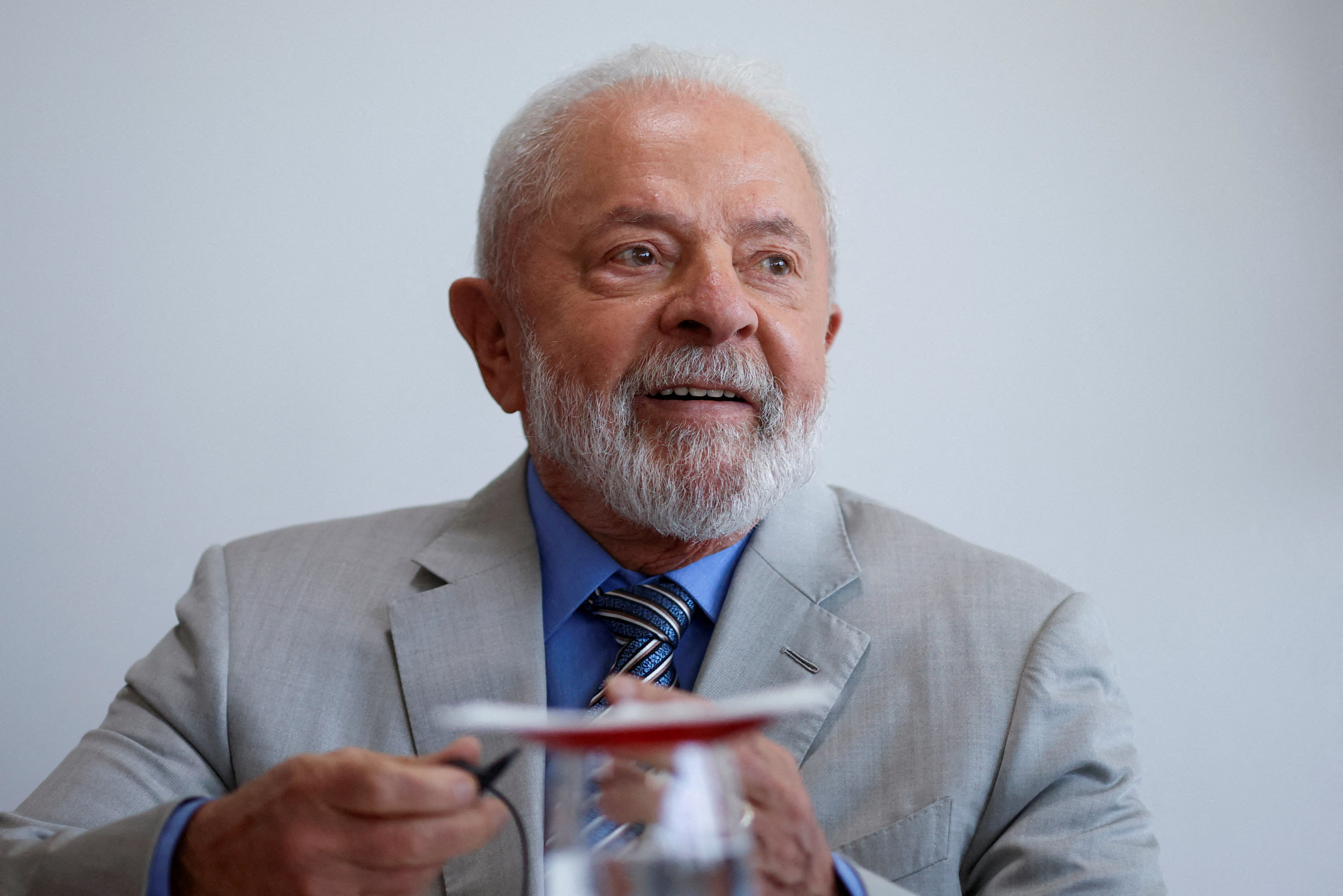 FILE PHOTO: Brazil's President Luiz Inacio Lula da Silva meets Chinese Politburo Standing Committee member, Li Xi