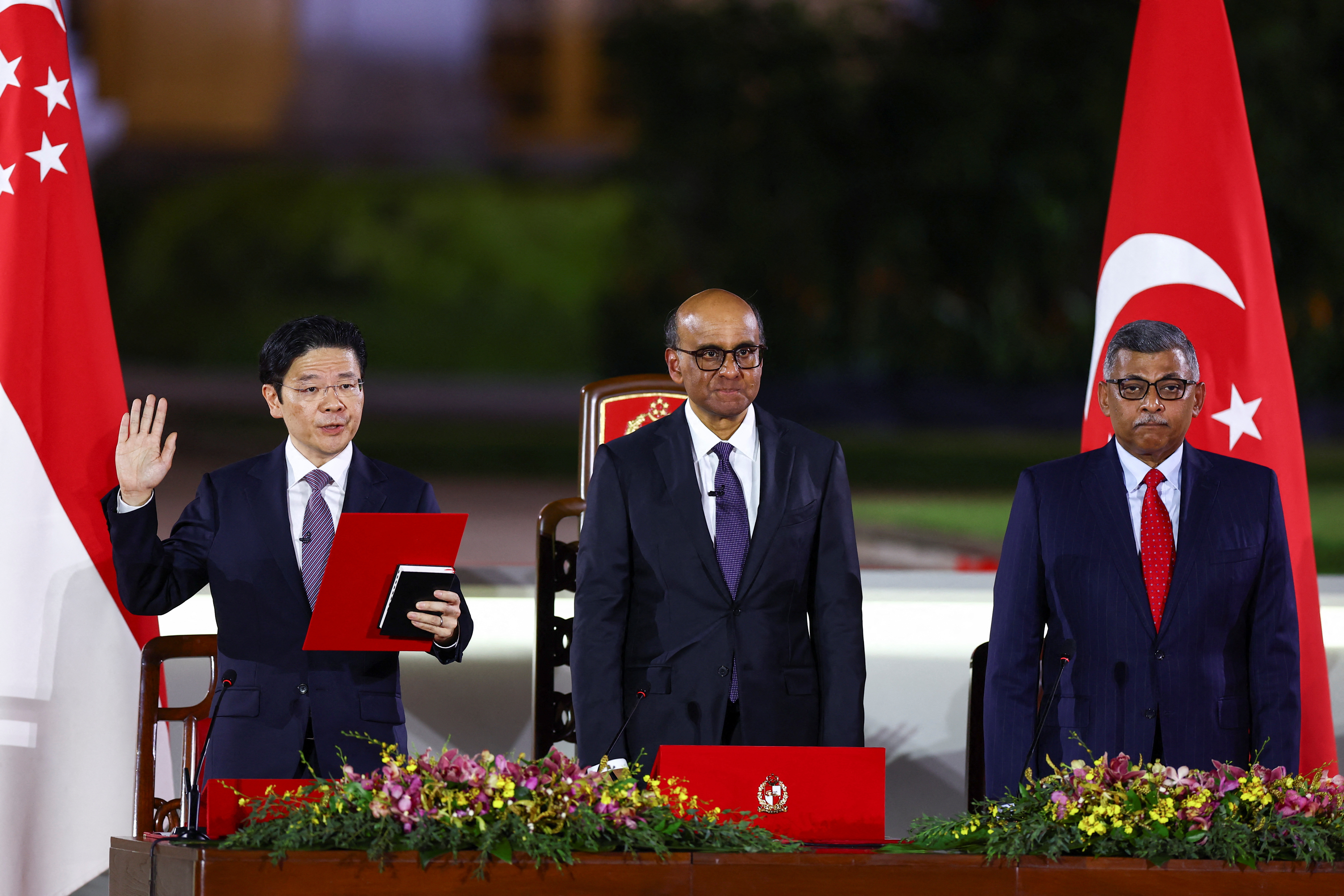 Singapore's Deputy Prime Minister and Minister of Finance Lawrence Wong is sworn in as Singapore's fourth Prime Minister