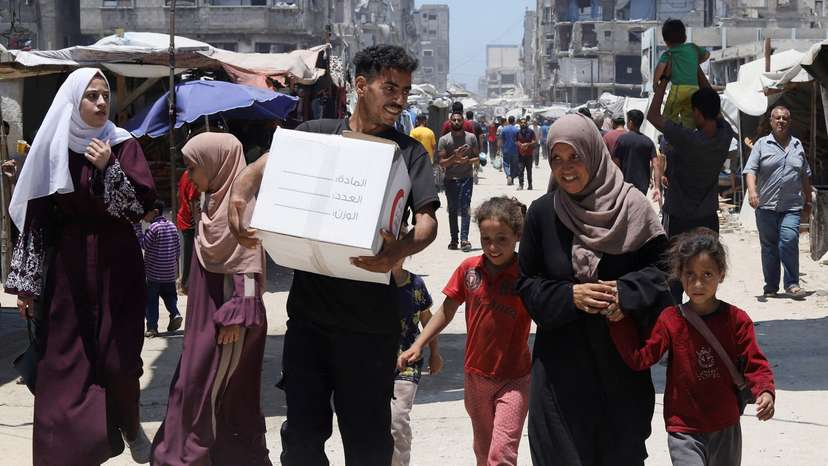 FILE PHOTO: Displaced Palestinian family in Gaza City receives first aid in months in Gaza City