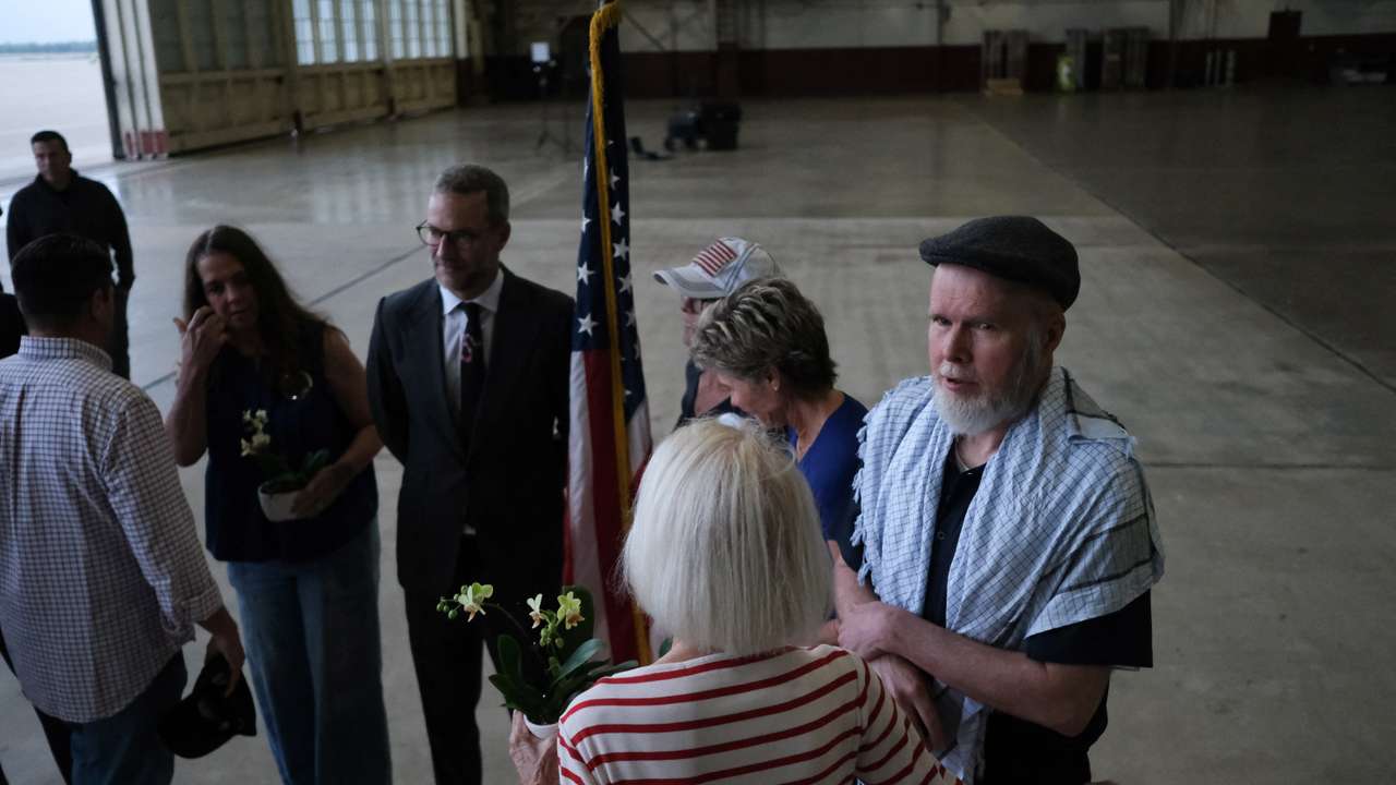 Dennis Coyle, who was detained by the Afghan Taliban government for more than year, arrives at Joint Base San Antonio