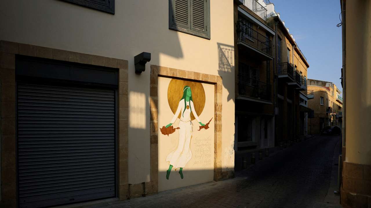 FILE PHOTO: A graffiti is seen near the UN-controlled buffer zone in Nicosia