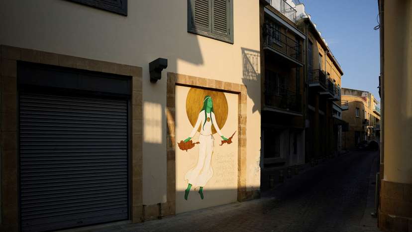 FILE PHOTO: A graffiti is seen near the UN-controlled buffer zone in Nicosia