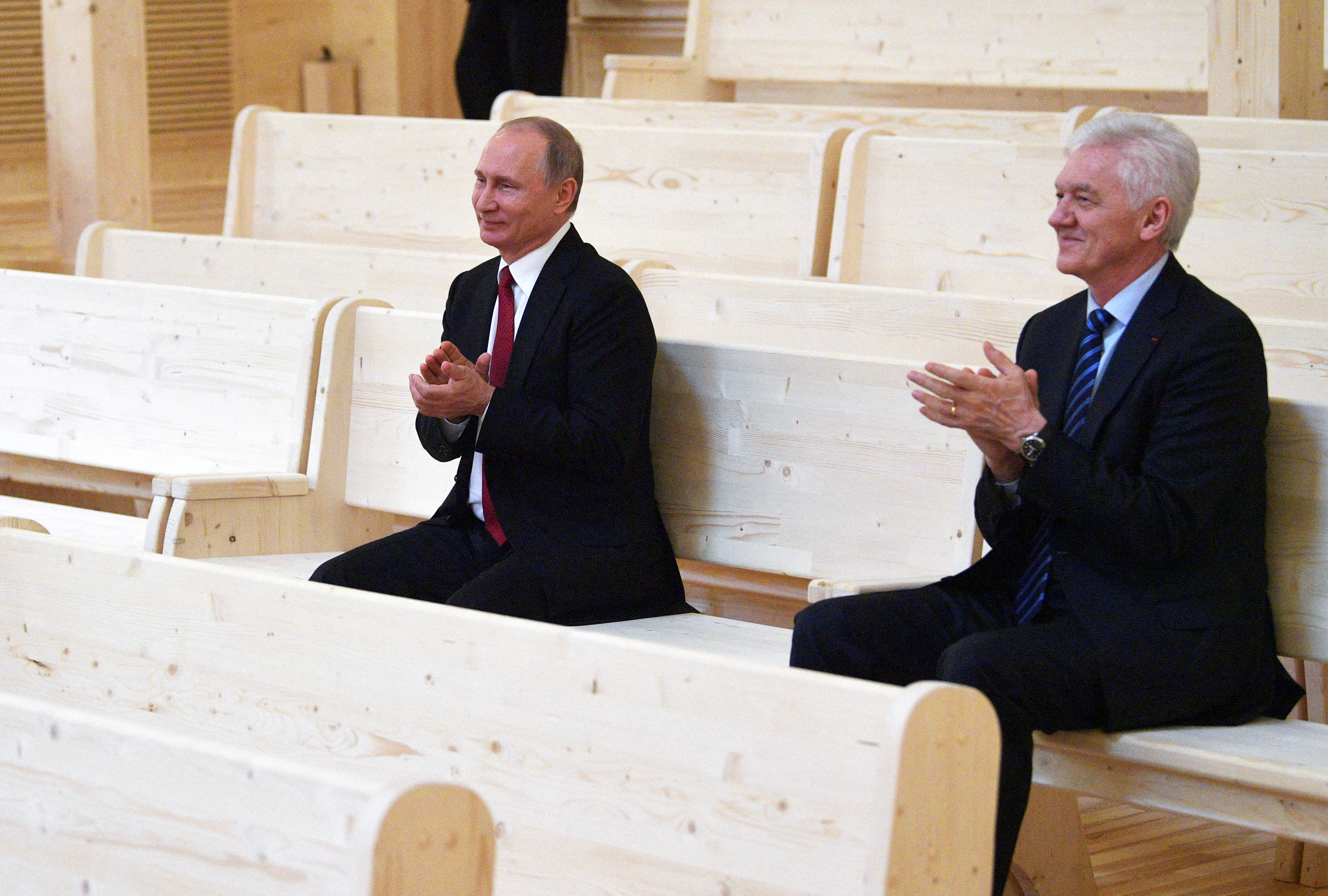 FILE PHOTO: Russian President Putin and businessman Timchenko visit a new concert hall of the Mariinsky Theater in St. Petersburg