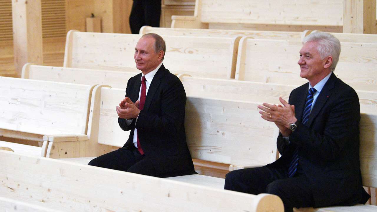 FILE PHOTO: Russian President Putin and businessman Timchenko visit a new concert hall of the Mariinsky Theater in St. Petersburg