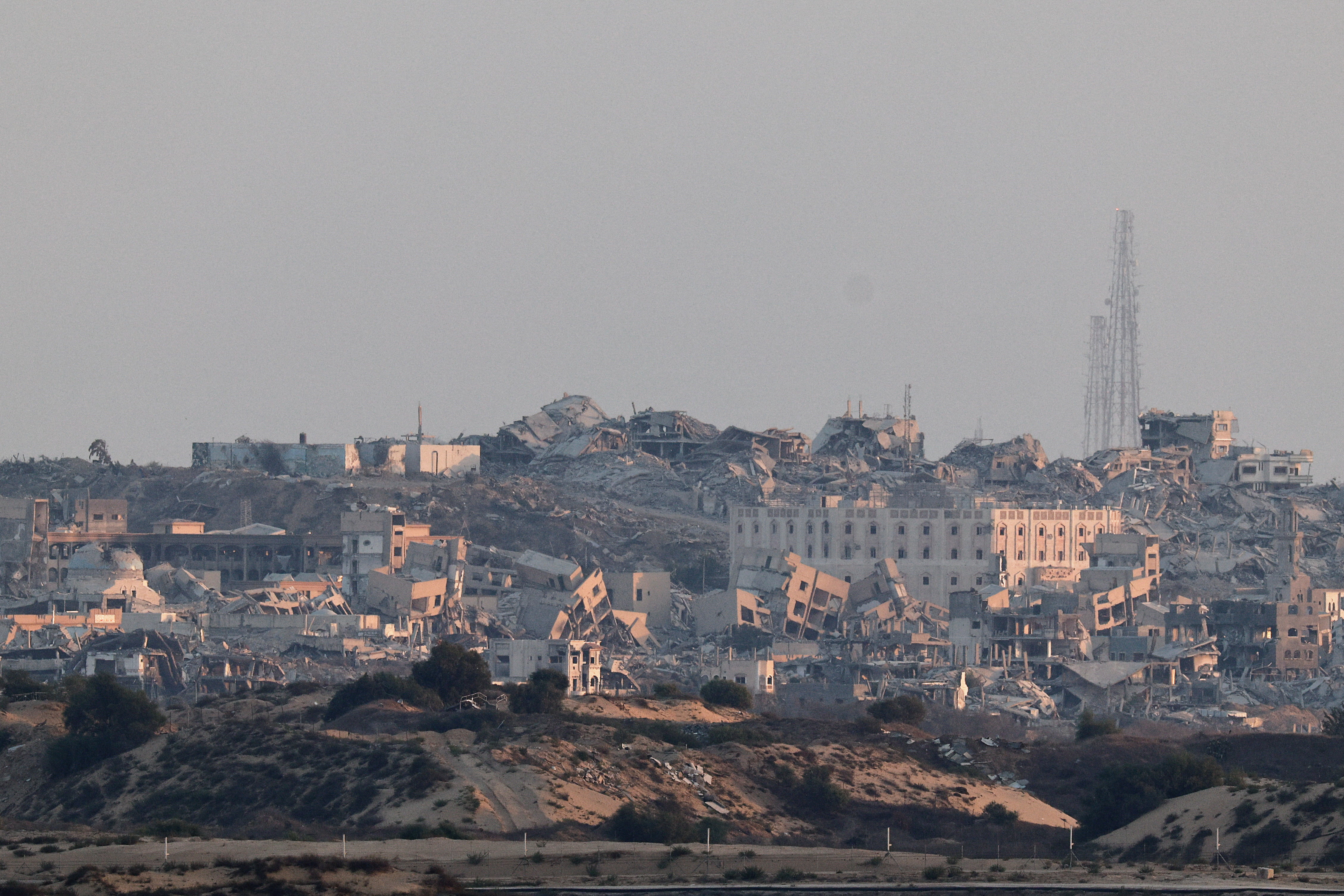 Building lie in ruin in Gaza, as seen from the Israeli side of the border with Gaza