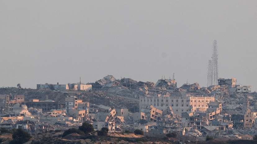 Building lie in ruin in Gaza, as seen from the Israeli side of the border with Gaza