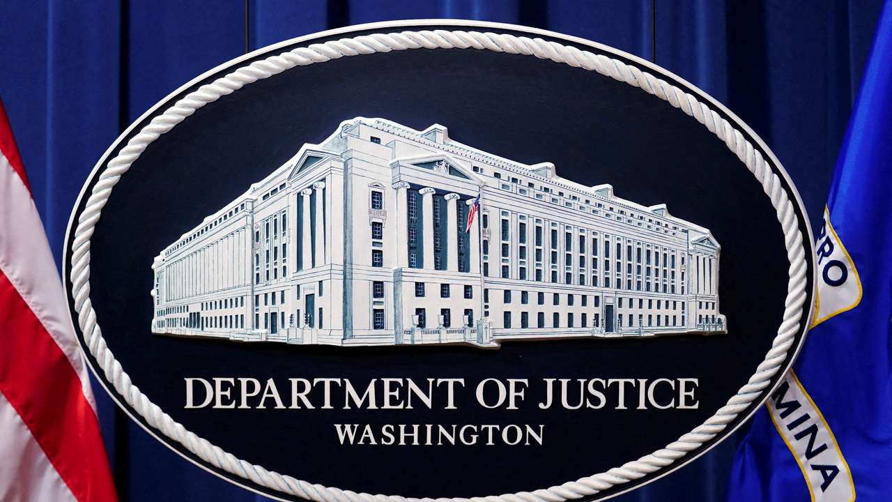 FILE PHOTO: U.S. Justice Department logo is seen at Justice Department headquarters in Washington