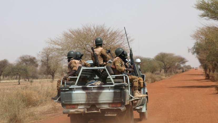 FILE PHOTO: Soldiers from Burkina Faso patrol on the road of Gorgadji in the Sahel area, Burkina Faso