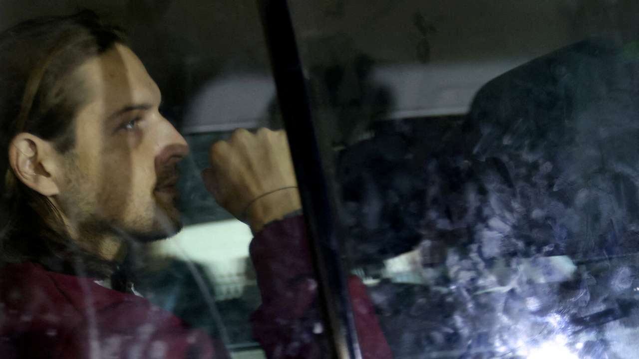 FILE PHOTO: Hostages are released as part of a deal between Israel and Palestinian Islamist group Hamas