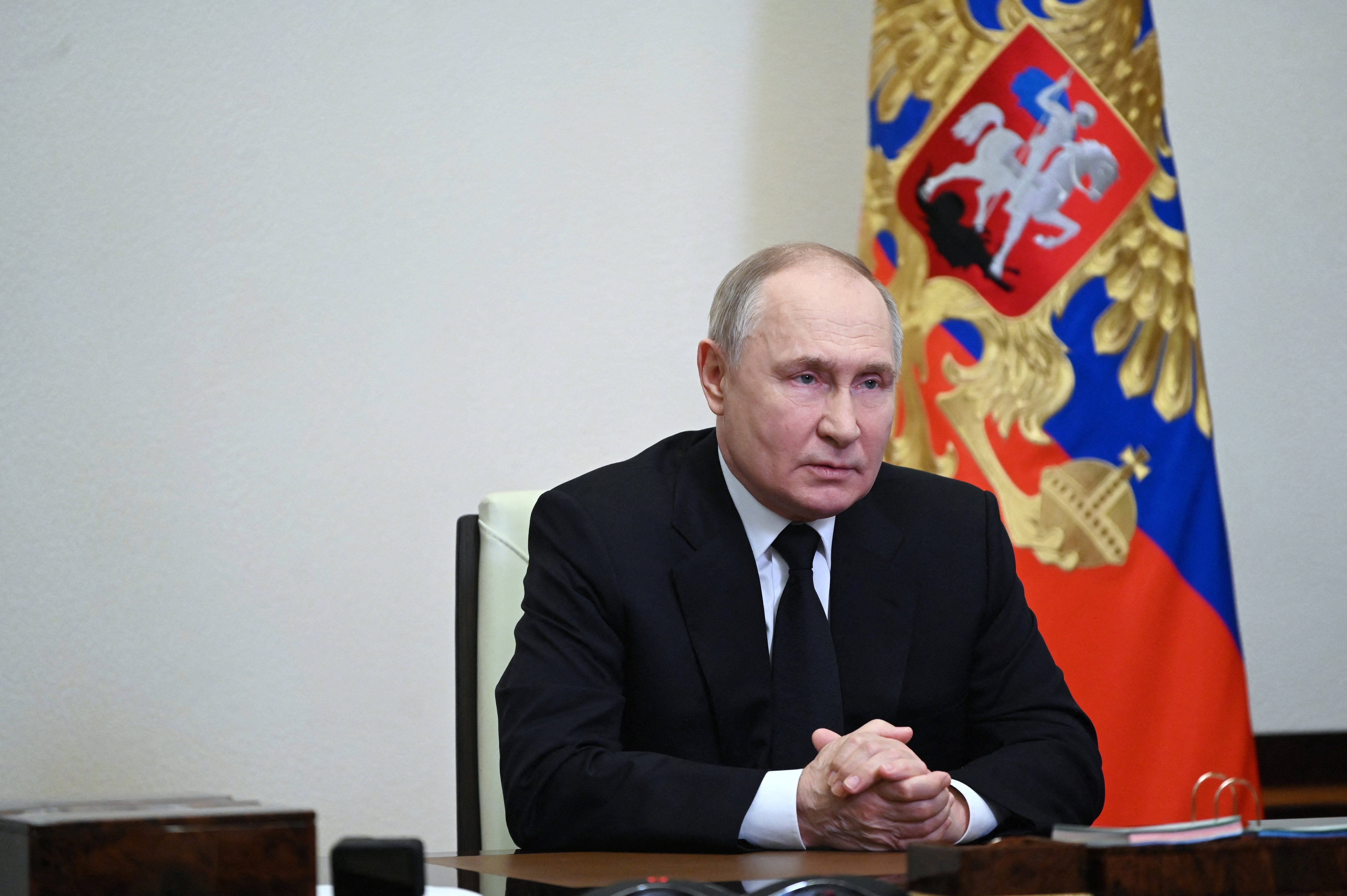 Russian President Vladimir Putin delivers a video address to the nation