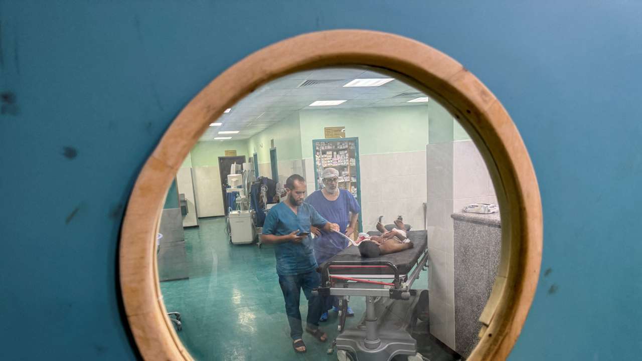 Palestinian boy Ahmed Abu Athab, who was wounded in an Israeli strike, receives treatment at Nasser hospital in Khan Younis, in the southern Gaza Strip