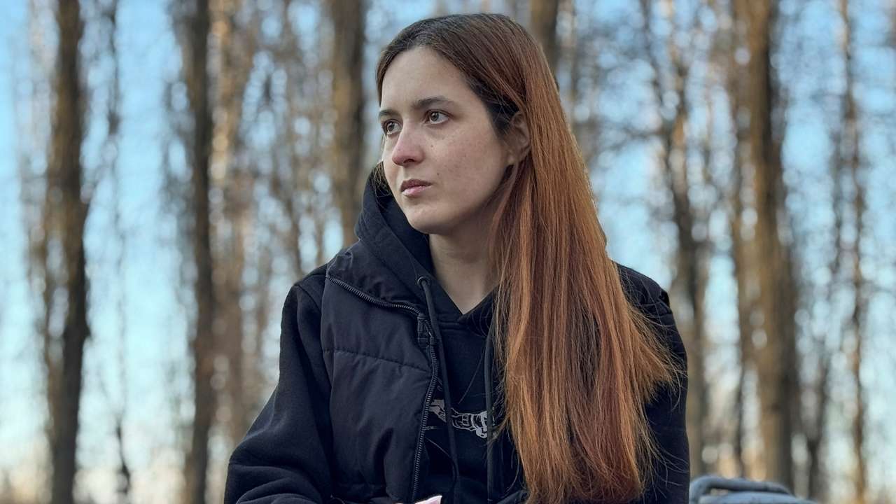 Bondarenko, partner of convicted Azov brigade member Smykov, speaks during an interview with Reuters in Kyiv