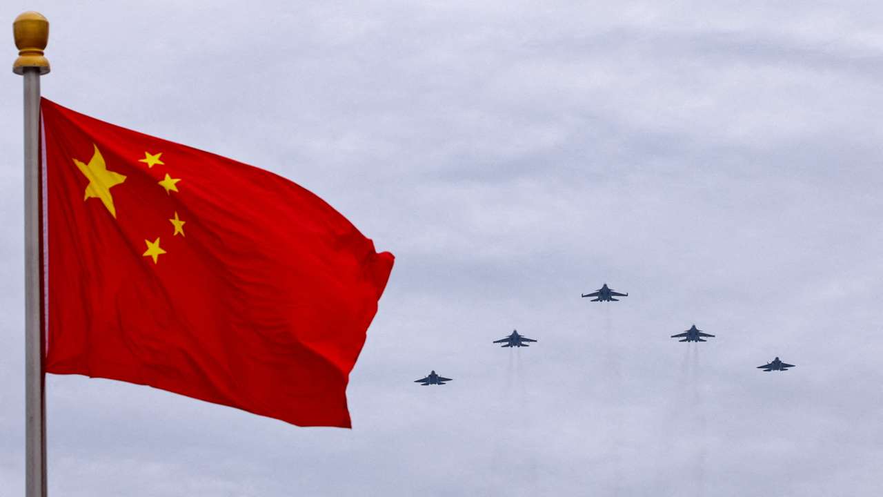 FILE PHOTO: Flyover rehearsal ahead of a military parade to mark the 80th anniversary of the end of World War Two, in Beijing