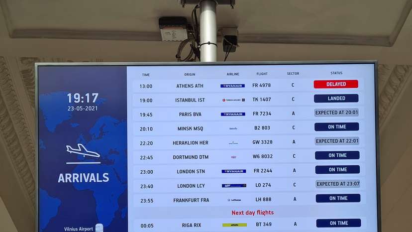 An information board showing international arrivals is pictured at Vilnius Airport, in Vilnius