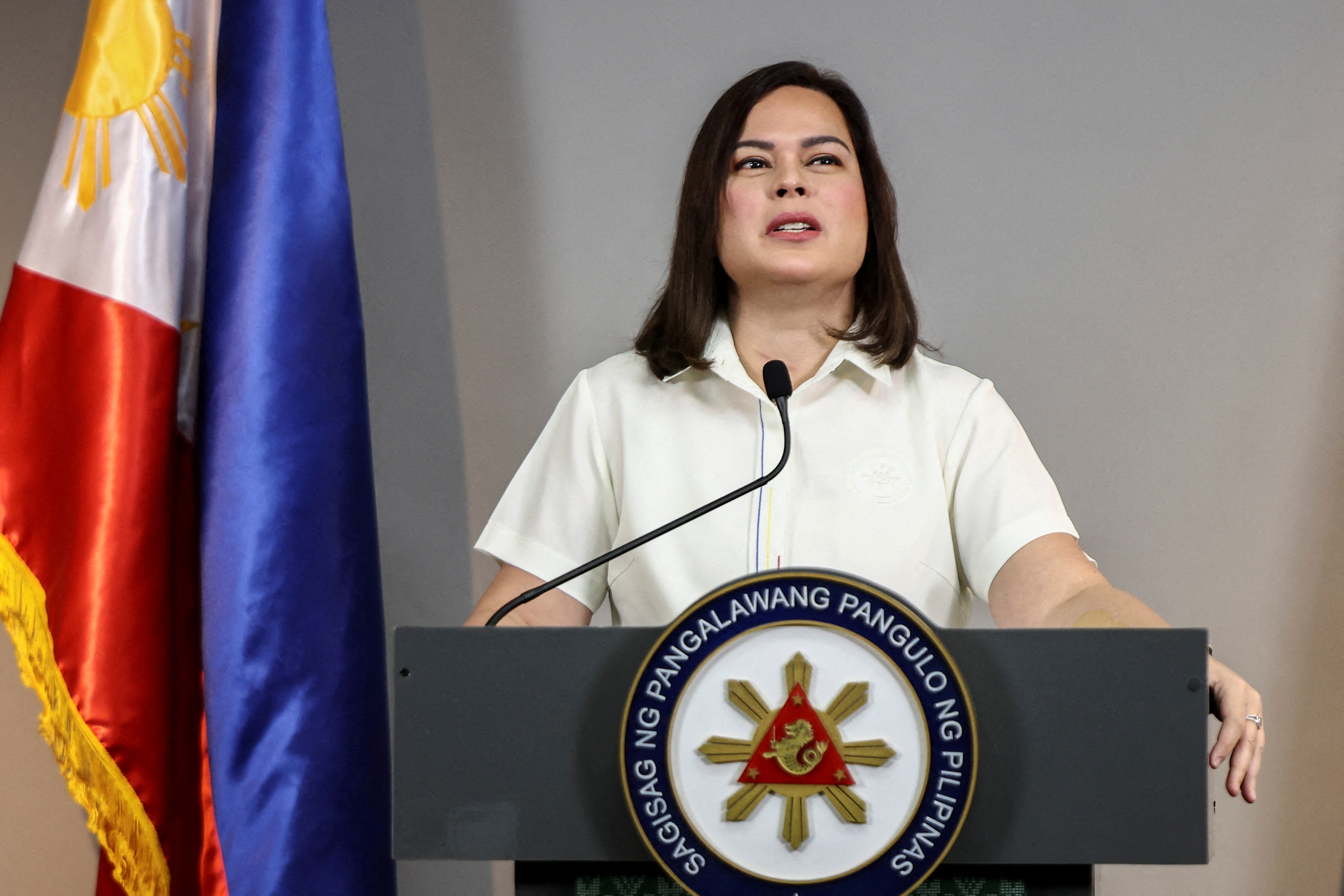 Philippine Vice President Sara Duterte delivers a statement following her impeachment by the lower house of the Congress
