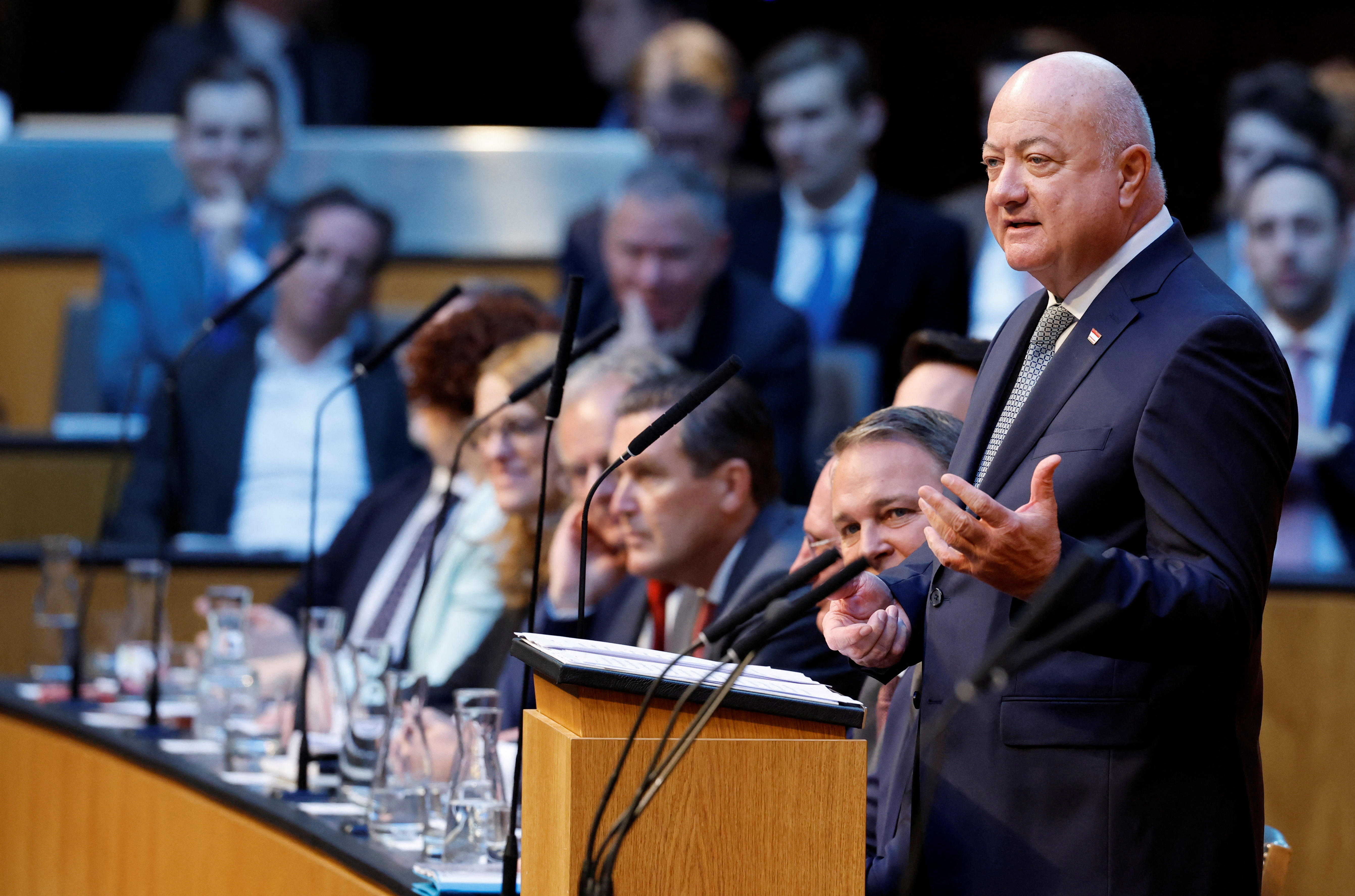 Austria's new coalition government addresses the parliament in Vienna